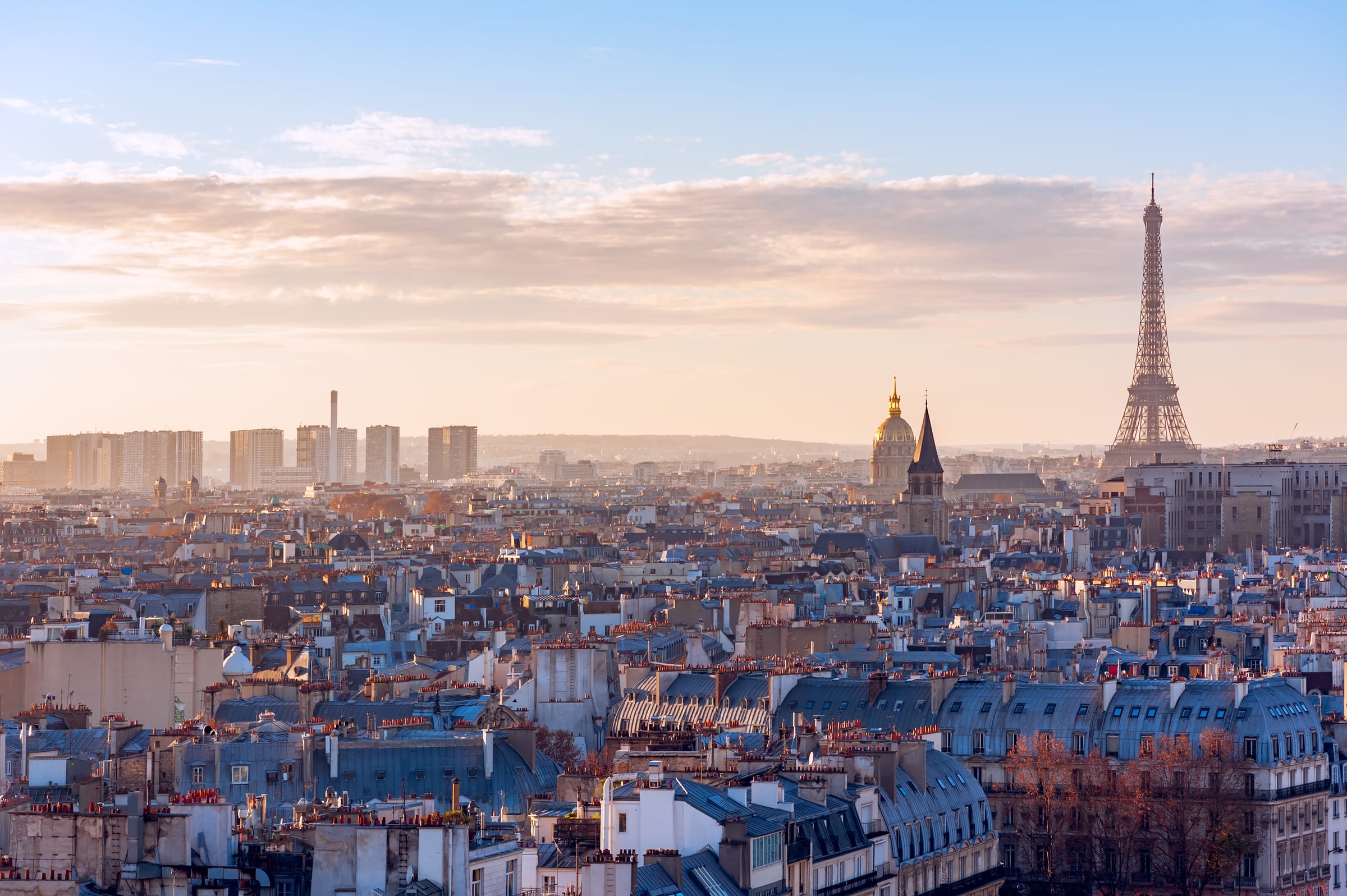Eiffel Tower and Paris rooftops at sunset